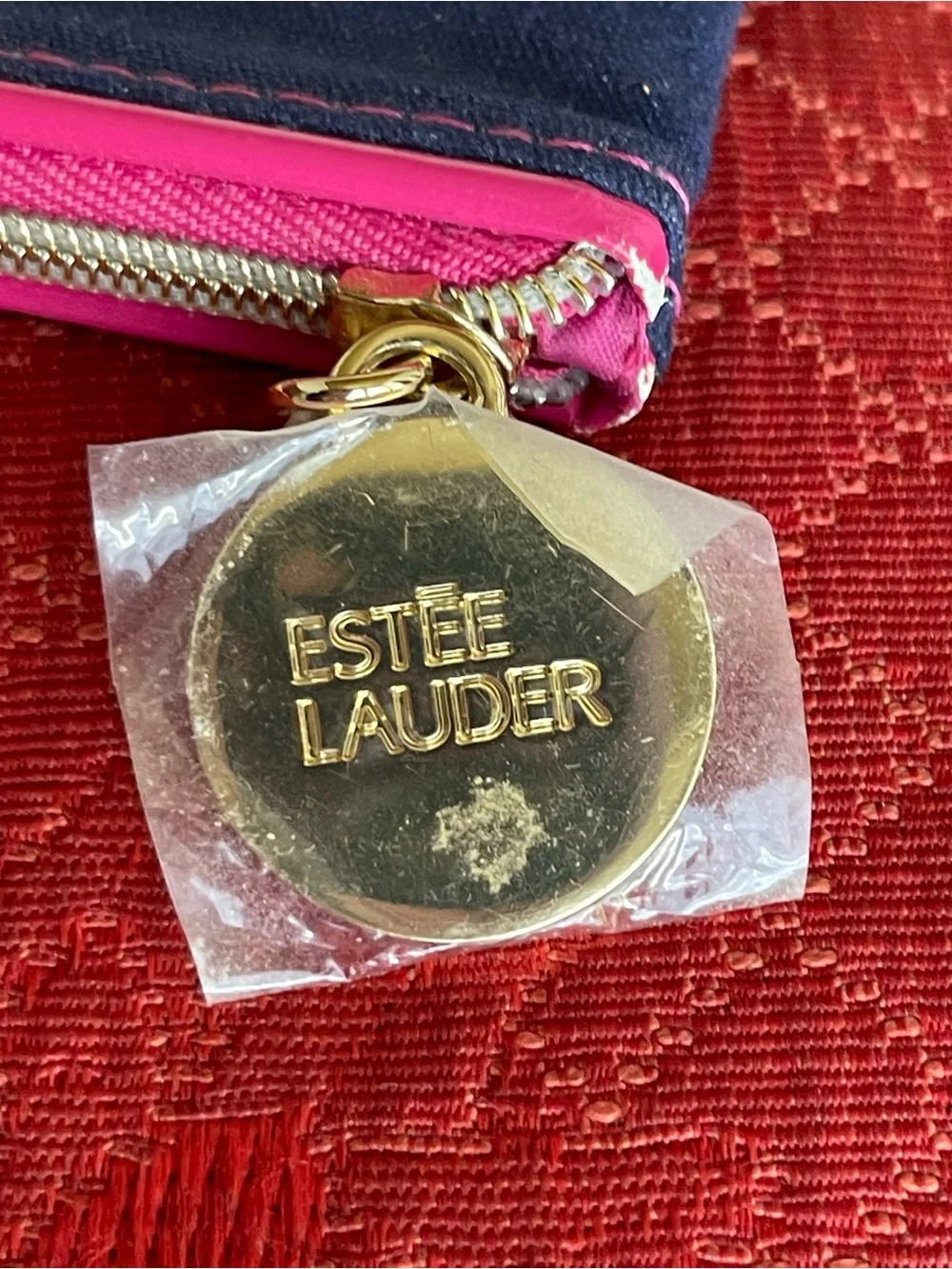 Estee Lauder Navy Cosmetic Pouch with Pink Trim and Yellow Star Print